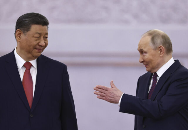 Руският президент Владимир Путин и китайският му колега Си Цзинпин на днешната им среща в Москва.