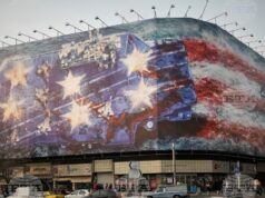 Опасността от избухване на война между САЩ и Иран изглежда все по-реална Билборд в центъра на Техеран, на който е изобразен повреден американски самолетоносач и надпис на фарси и на английски: "Ако посееш вятъра, ще пожънеш вихрушката", 25 януари 2026 година.